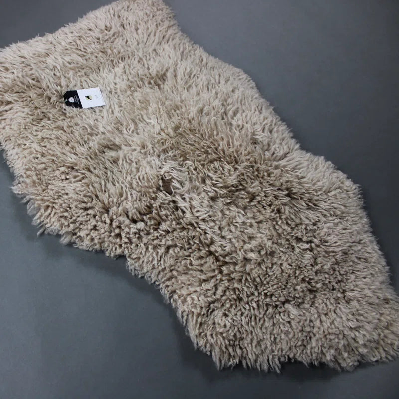 Radhika Curly Sheepskin Rug in Beige