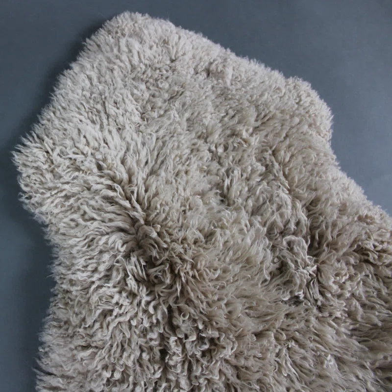 Radhika Curly Sheepskin Rug in Beige